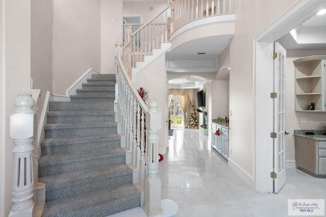 stairs with a high ceiling