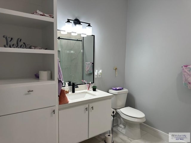 bathroom with tile patterned floors, toilet, vanity, and walk in shower