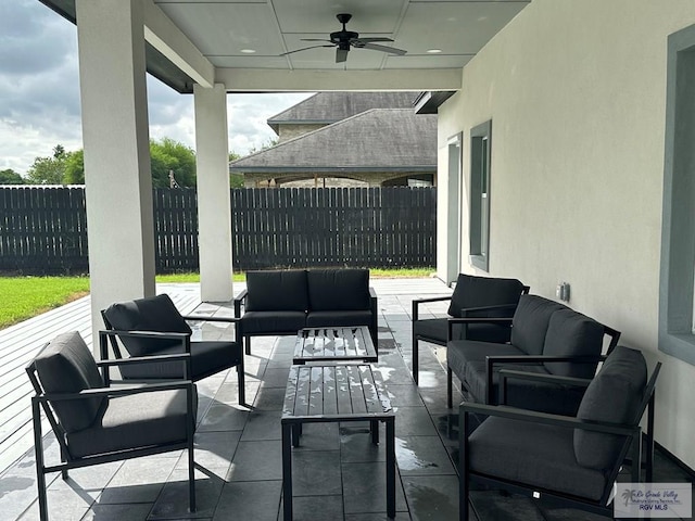 view of patio featuring ceiling fan and an outdoor hangout area