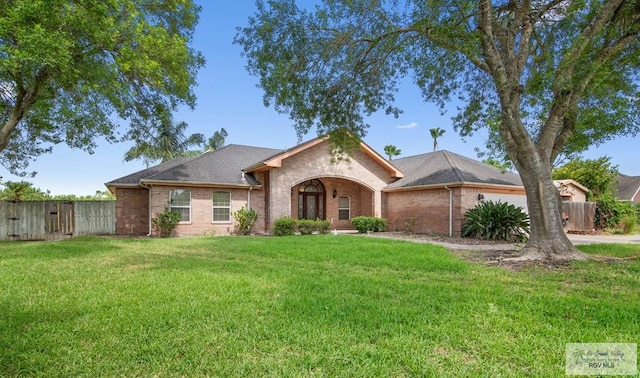 ranch-style house with a front yard