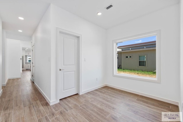 hall featuring light hardwood / wood-style floors