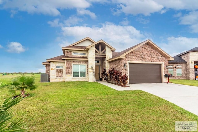 craftsman house with cooling unit, a garage, and a front lawn