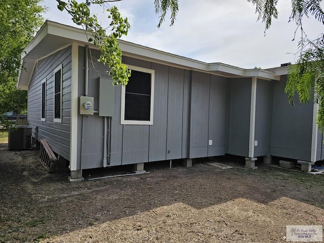 view of property exterior featuring central AC