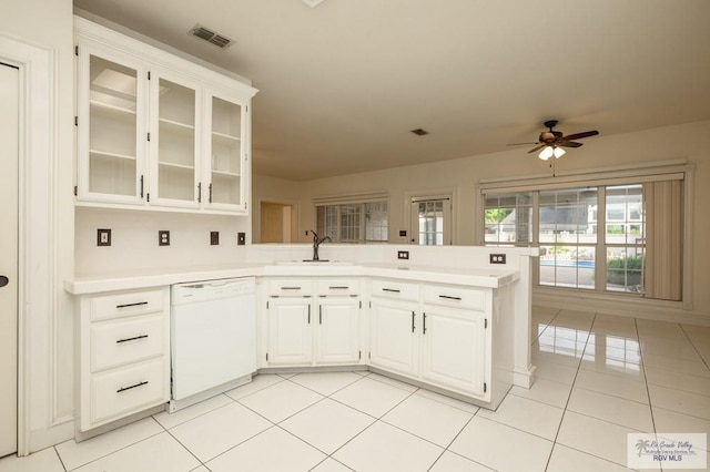 212 E Xenops Ave, Mcallen, TX 78504 - kitchen featuring dishwasher, a peninsula, a ceiling fan, and light countertops