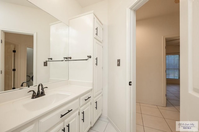 212 E Xenops Ave, Mcallen, TX 78504 - bathroom with vanity and tile patterned floors