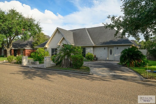 212 E Xenops Ave, Mcallen, TX 78504 - view of front facade with brick siding
