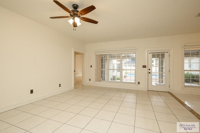 212 E Xenops Ave, Mcallen, TX 78504 - spare room featuring ceiling fan and light tile patterned floors