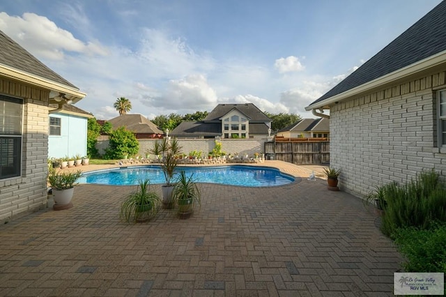 212 E Xenops Ave, Mcallen, TX 78504 - view of swimming pool featuring a patio area and a fenced backyard