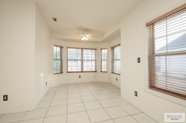 212 E Xenops Ave, Mcallen, TX 78504 - spare room featuring ceiling fan, plenty of natural light, and light tile patterned flooring