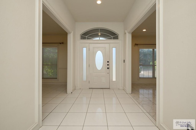 212 E Xenops Ave, Mcallen, TX 78504 - foyer with recessed lighting and light tile patterned flooring