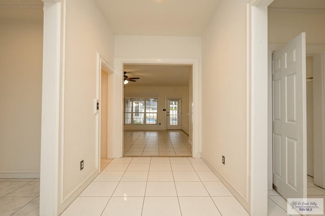 212 E Xenops Ave, Mcallen, TX 78504 - hallway with baseboards and light tile patterned floors