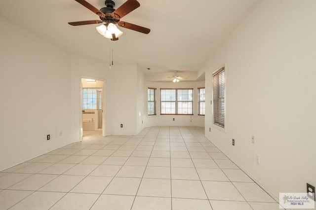 212 E Xenops Ave, Mcallen, TX 78504 - empty room featuring ceiling fan and light tile patterned floors
