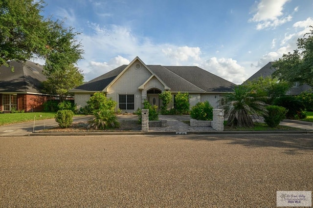 212 E Xenops Ave, Mcallen, TX 78504 - view of front of house with brick siding