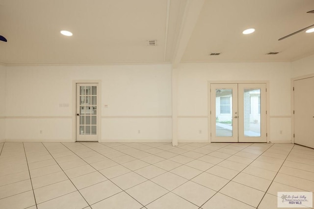 212 E Xenops Ave, Mcallen, TX 78504 - unfurnished room with french doors, recessed lighting, and light tile patterned floors