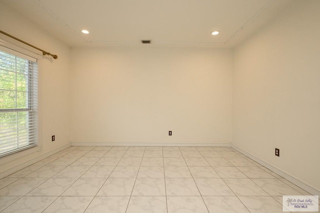 212 E Xenops Ave, Mcallen, TX 78504 - empty room featuring recessed lighting and baseboards