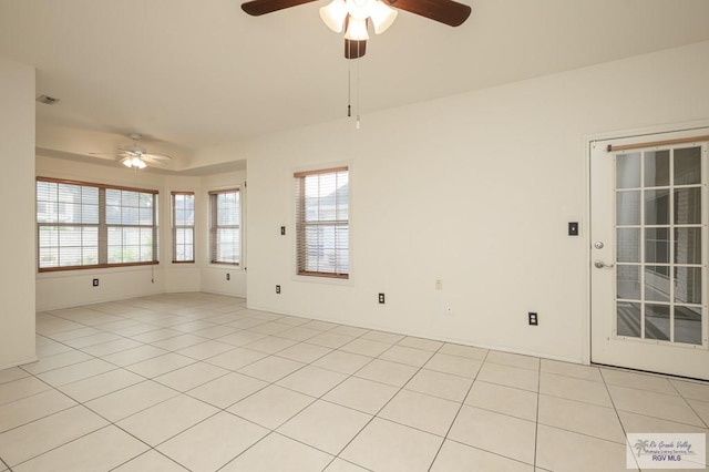212 E Xenops Ave, Mcallen, TX 78504 - spare room featuring ceiling fan, healthy amount of natural light, and light tile patterned floors
