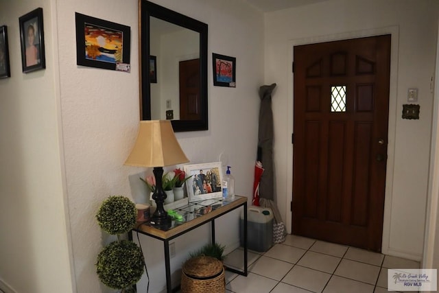 view of tiled foyer entrance
