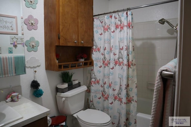 full bathroom featuring vanity, shower / bath combo, and toilet