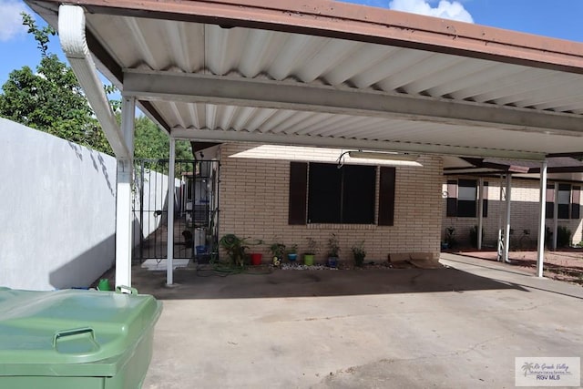 view of patio featuring a carport