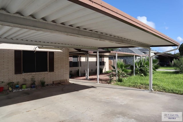 view of patio / terrace featuring a carport
