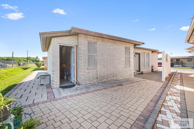 rear view of house with a patio area