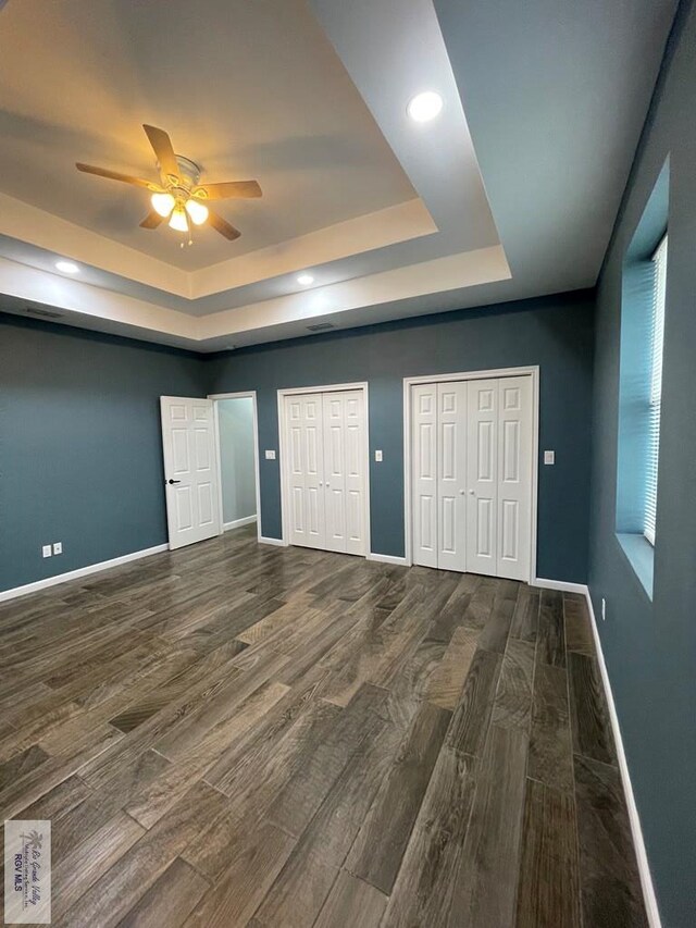 foyer featuring dark hardwood / wood-style floors, french doors, and a chandelier