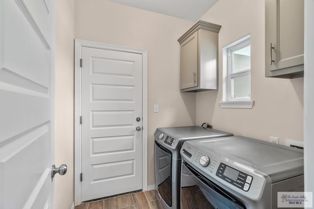 9725 Hawk Dr, Harlingen, TX 78552 - laundry area with cabinet space, washer and clothes dryer, and light wood finished floors