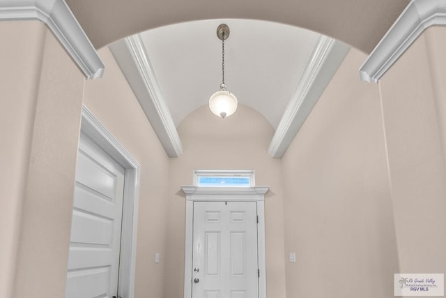 9725 Hawk Dr, Harlingen, TX 78552 - entryway featuring vaulted ceiling and arched walkways