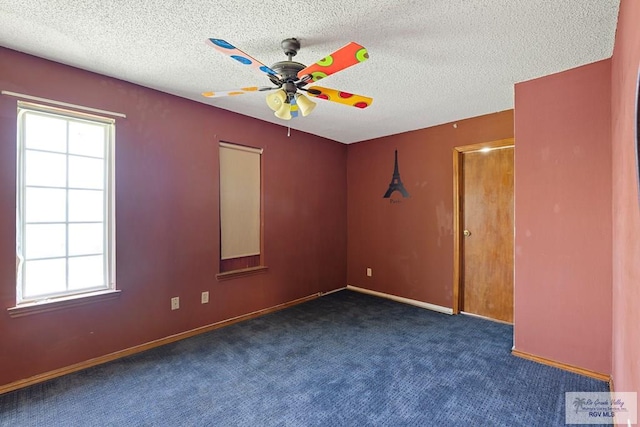 28880 Bass Blvd, Harlingen, TX 78552 - carpeted empty room with a ceiling fan, plenty of natural light, and a textured ceiling