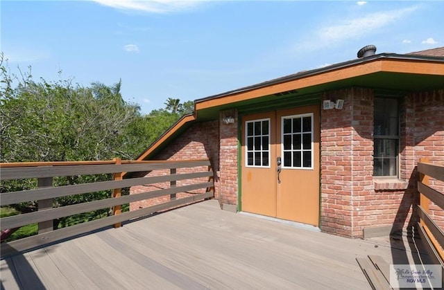 28880 Bass Blvd, Harlingen, TX 78552 - wooden deck featuring french doors