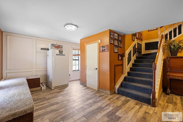 28880 Bass Blvd, Harlingen, TX 78552 - stairway featuring wood finished floors and a decorative wall