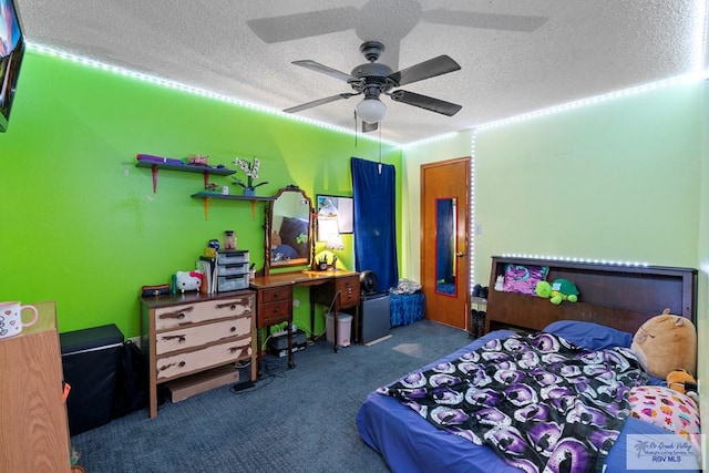28880 Bass Blvd, Harlingen, TX 78552 - carpeted bedroom featuring a textured ceiling and a ceiling fan