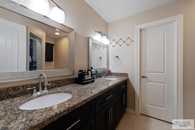 bathroom with vanity and tile patterned floors