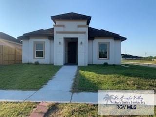 view of front of home with a front yard