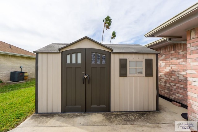 view of outbuilding with central AC