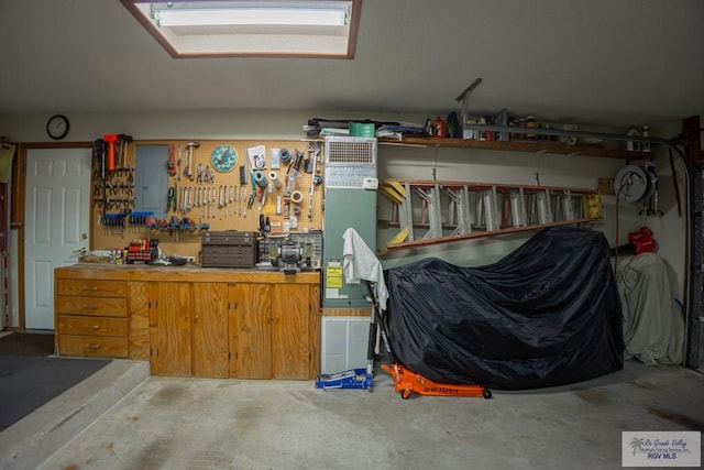 garage with a workshop area