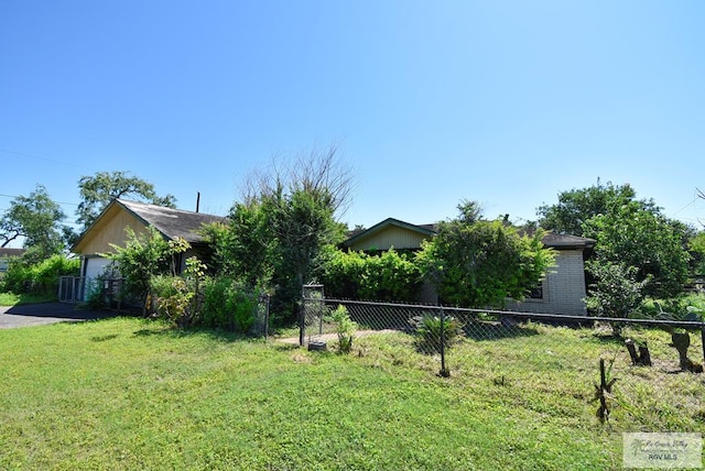 195 W 3rd St, Sebastian, TX 78594 - view of front of house featuring a garage