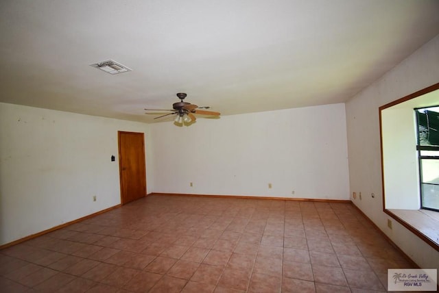 195 W 3rd St, Sebastian, TX 78594 - unfurnished room with a ceiling fan and baseboards