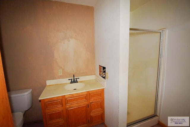 195 W 3rd St, Sebastian, TX 78594 - full bath featuring a stall shower, toilet, and vanity