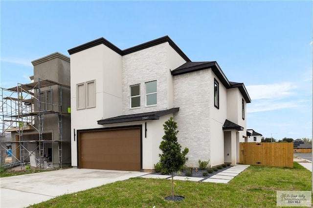 2507 E Solar Dr Lot 45, Mission, TX 78501 - view of front facade with a garage and a front lawn