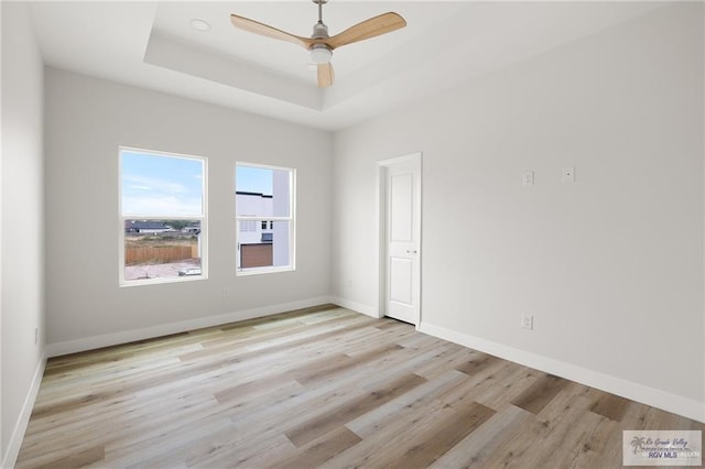 2507 E Solar Dr Lot 45, Mission, TX 78501 - spare room featuring a raised ceiling, light hardwood / wood-style flooring, and ceiling fan