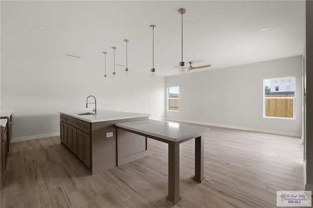 2507 E Solar Dr Lot 45, Mission, TX 78501 - kitchen featuring ceiling fan, a healthy amount of sunlight, sink, and an island with sink