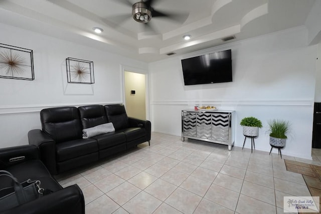 448 Rey Juan Carlos St, Brownsville, TX 78521 - living area with ceiling fan, a tray ceiling, light tile patterned floors, a decorative wall, and recessed lighting