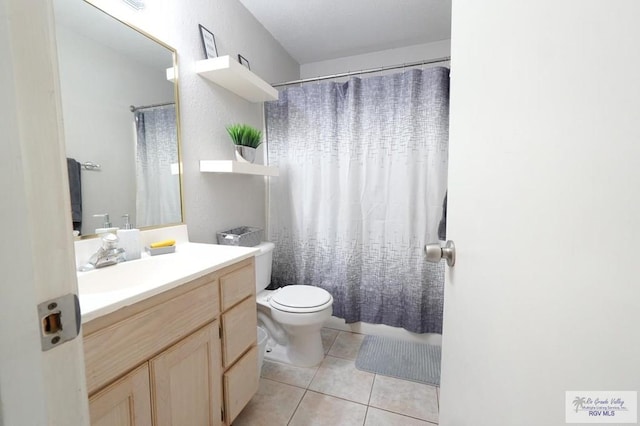 448 Rey Juan Carlos St, Brownsville, TX 78521 - bathroom with vanity, toilet, and tile patterned floors
