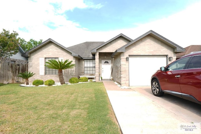 448 Rey Juan Carlos St, Brownsville, TX 78521 - single story home featuring an attached garage, concrete driveway, and brick siding