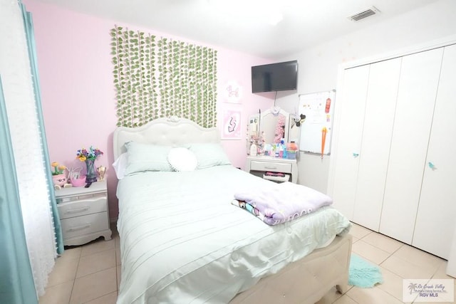 448 Rey Juan Carlos St, Brownsville, TX 78521 - bedroom with a closet and light tile patterned flooring