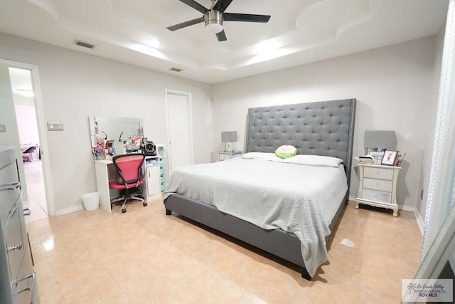 448 Rey Juan Carlos St, Brownsville, TX 78521 - bedroom with a tray ceiling, a desk, ceiling fan, and baseboards