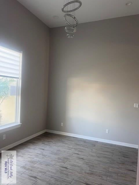 9206 Empress Ln, Harlingen, TX 78552 - empty room featuring baseboards