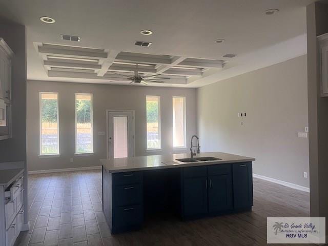 9206 Empress Ln, Harlingen, TX 78552 - kitchen with a sink, coffered ceiling, dark wood-style flooring, light countertops, and a ceiling fan
