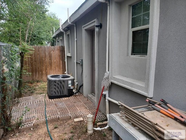 view of home's exterior featuring central AC